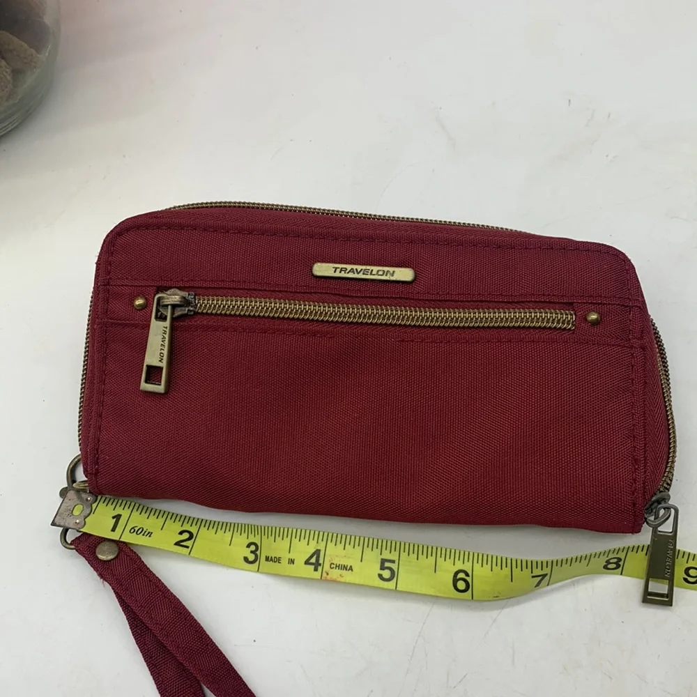 Red travelon standard size nylon wallet as is. SM3741